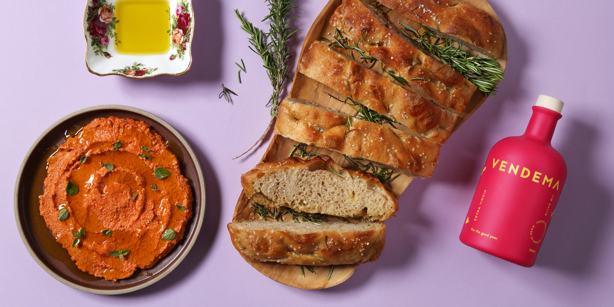 Vendema Extra Virgin Olive Oil Bottle served with Foccacia and Muhammara Dip.