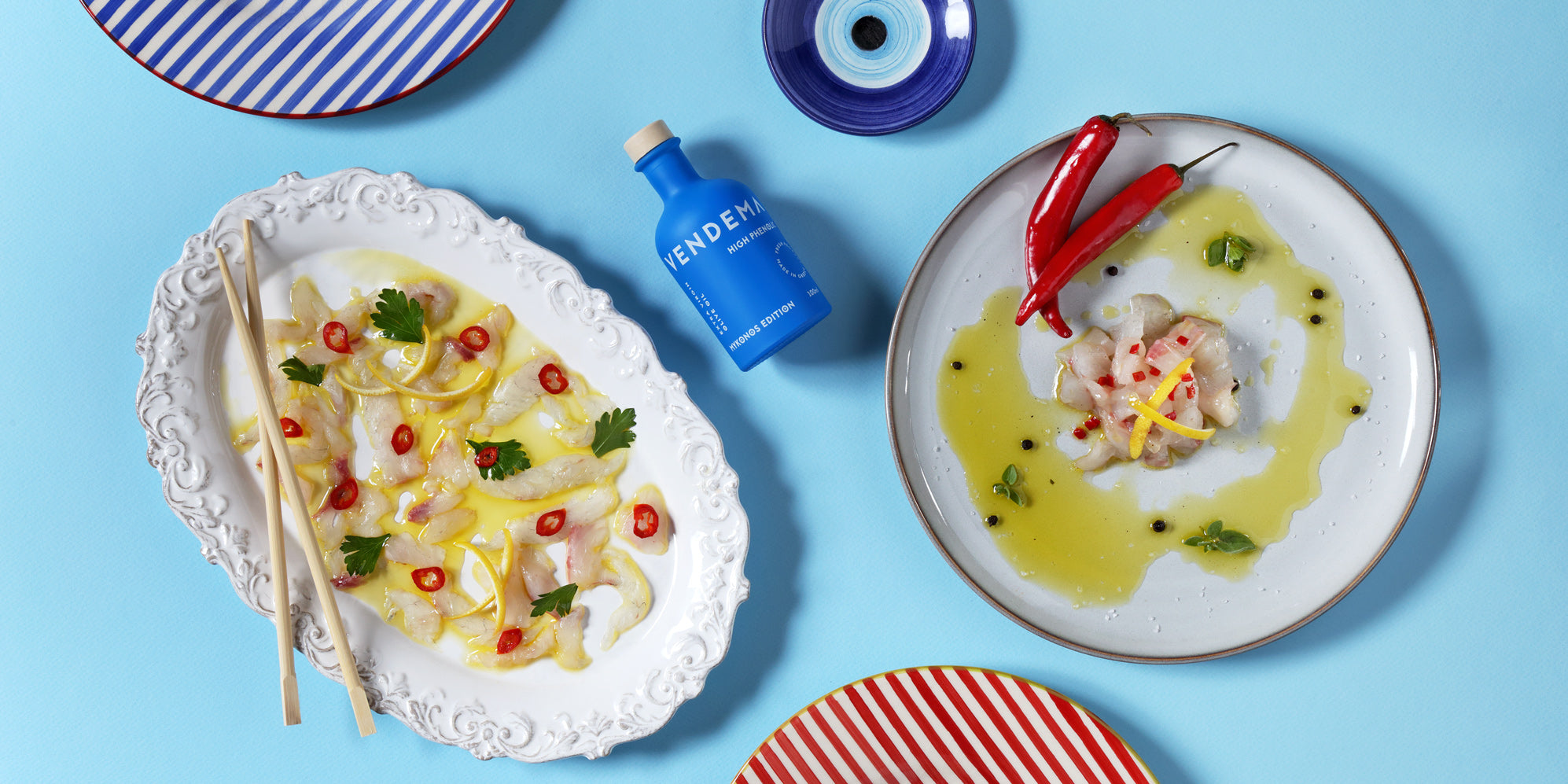 Vendema High Phenolic Extra Virgin Olive Oil Bottle served with Fish Carpaccio.