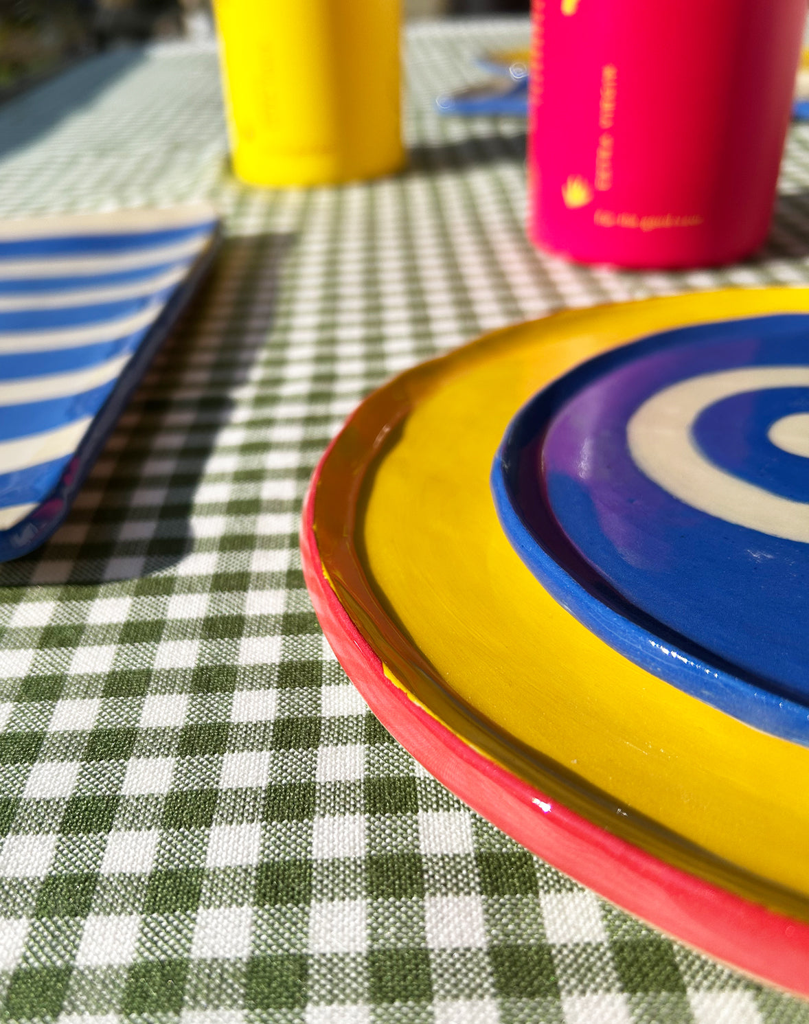 Detail of yellow ceramic dinner plate.